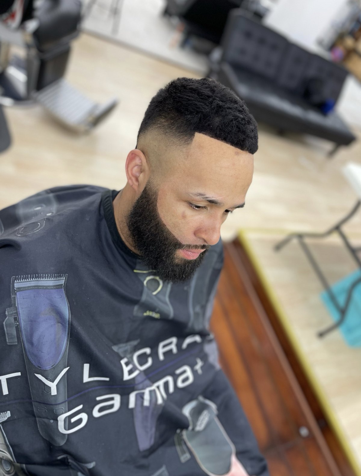 Skin fade with a hard part at VIC-TORY Barbershop West Chester PA